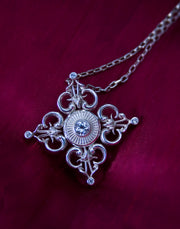 THE SUNBURST CROSS PENDANT WITH AQUAMARINE